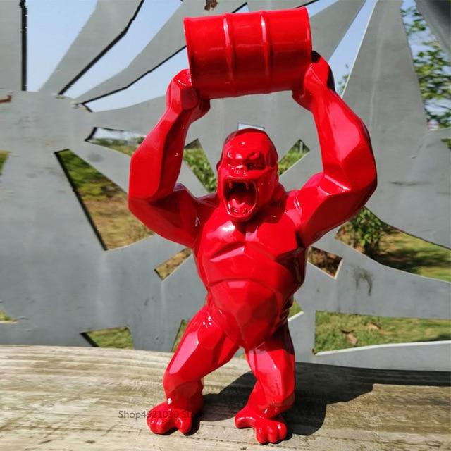 statut king kong avec tonneau rouge